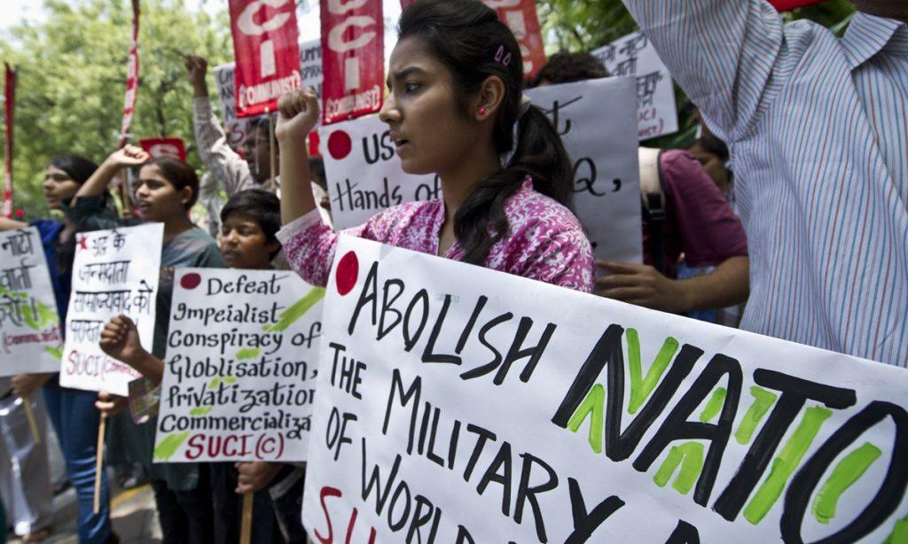 Indian people carry slogans at a demonstration against NATO during a protest in New Delhi. Photo: AFP