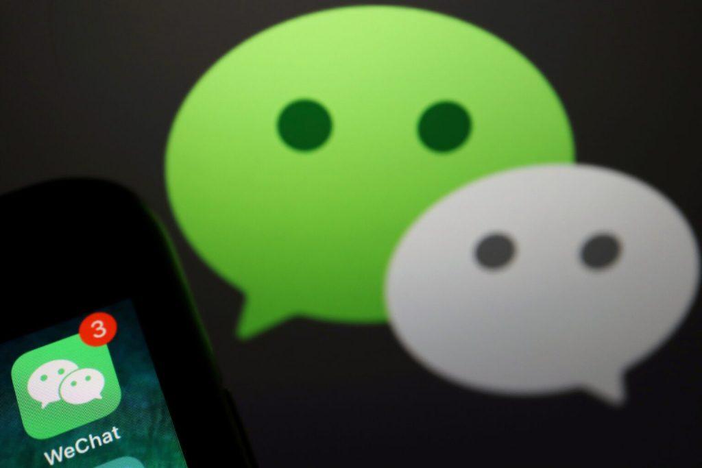 The messenger app WeChat is seen next to its logo. Illustration Picture (c): Reuters/Florence Lo/Illustration